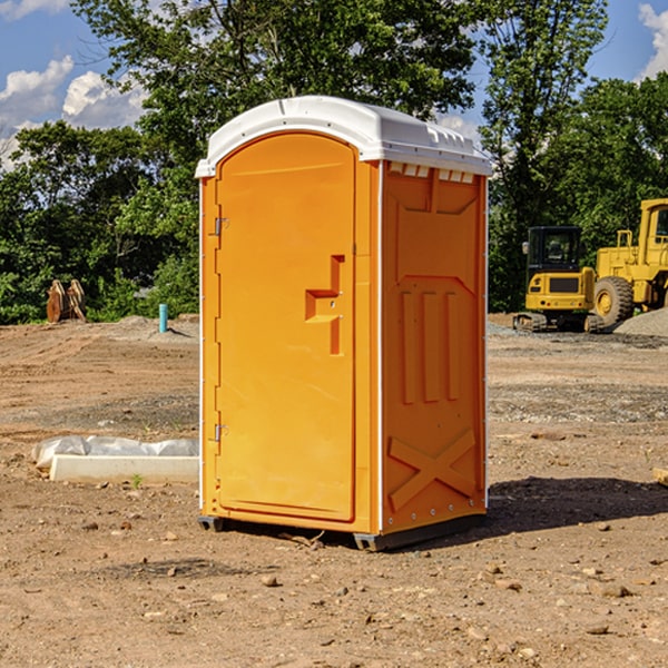 what is the cost difference between standard and deluxe portable toilet rentals in Randolph County